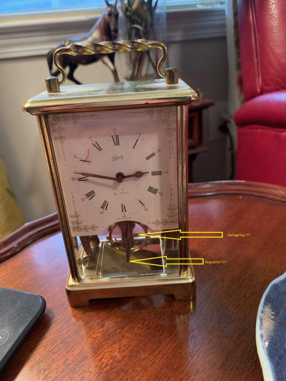 Carriage clock w arrows.jpg